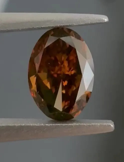 0.56ct Oval Natural Diamond (Colour Fancy Dark Orange Brown, Clarity VS2, GIA Certified)