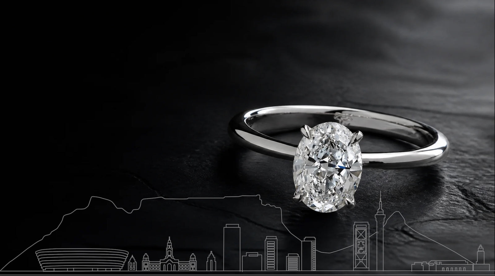 Poggenpoel Cape Town studio — engagement ring against Cape Town skyline